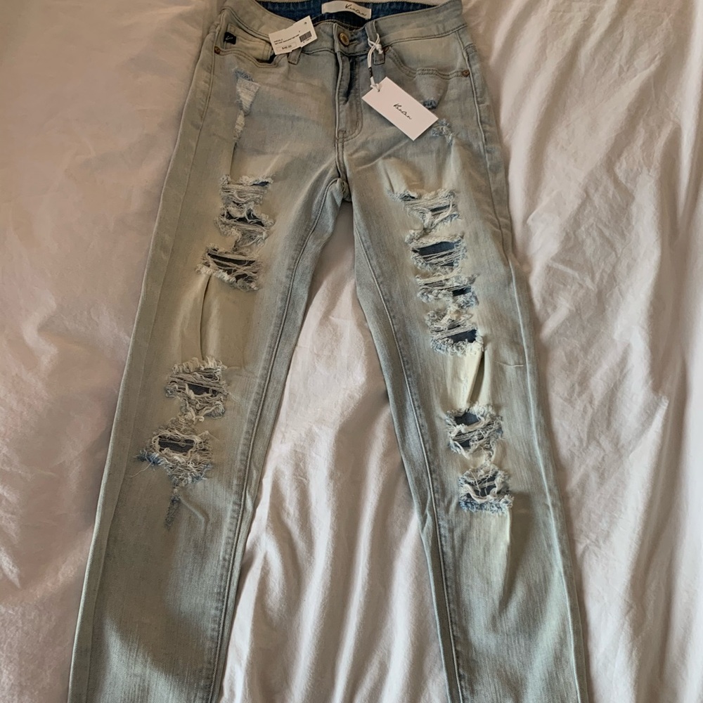 Light wash destructed high waisted skinnies
